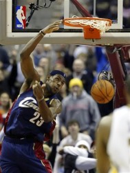 LeBron James dunks against the Indians Pacers during the third quarter of the Cavaliers’ 94-89 NBA basketball win Friday, Dec. 23, 2005, in Cleveland.