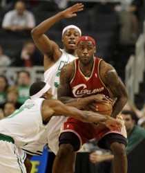 Bostonâ€™s Paul Pierce and Rajon Rondo, left, pressure Clevelandâ€™s LeBron James in the first half.